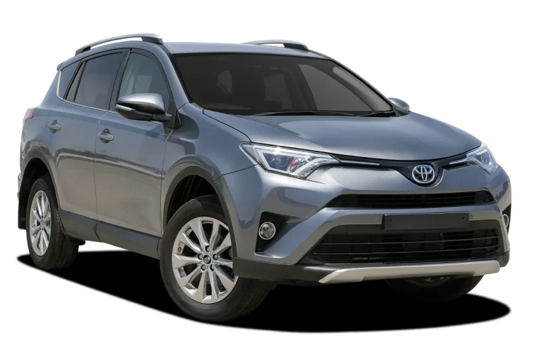 Grey Toyota RAV4 SUV with roof rails and alloy wheels on a white background